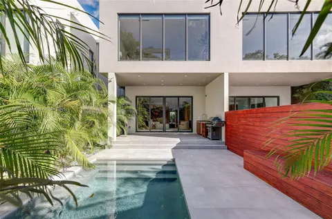 a front view of a house with a porch