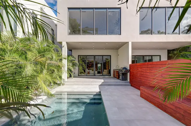 a front view of a house with a porch
