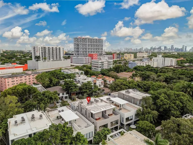 an aerial view of multiple house