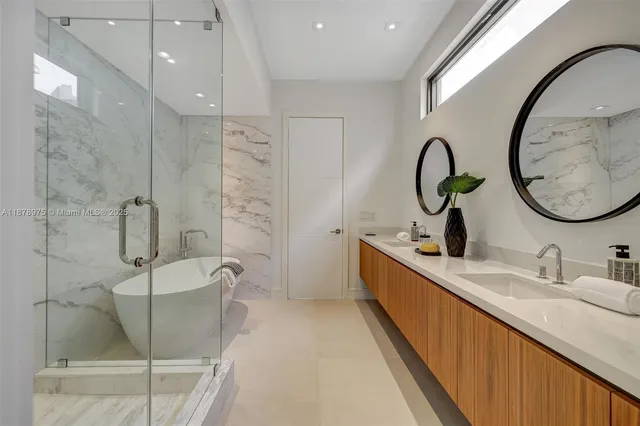 a bathroom with a sink and mirror