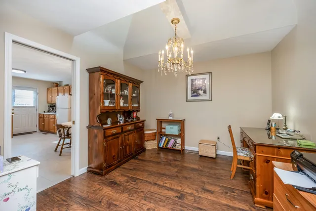 a view of a dining room with furniture