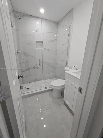 a view of a closet area with an empty door