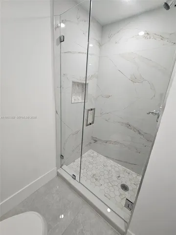 a view of a backyard of the house