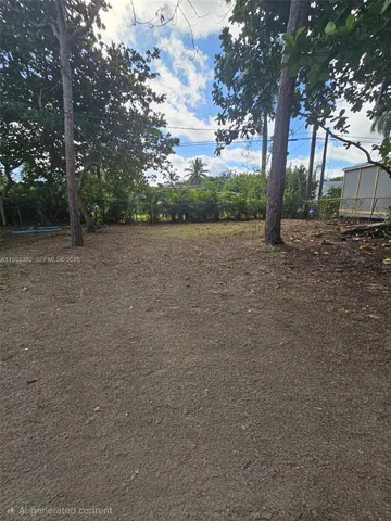 a view of a yard in front of a house