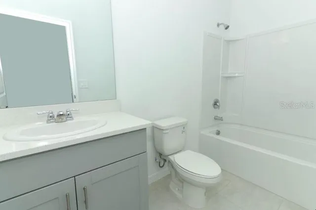 an entryway of a house with utility area