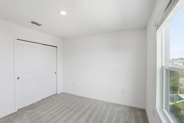 a bathroom with a sink toilet and vanity