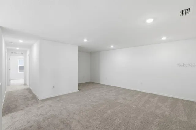 a view of a back yard of the house