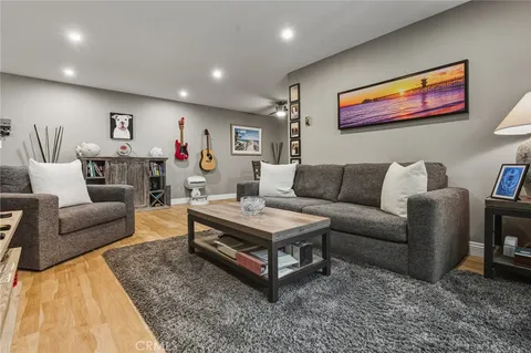 a view of a hallway with paintings on the wall