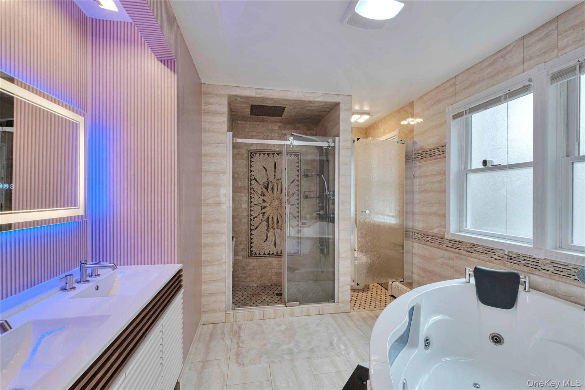 193 Nelson Road Scarsdale, NY 10583 - Photo 20 of 37 a bathroom with a granite countertop sink a shower and a mirror
