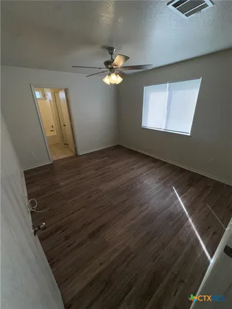 a bathroom with a sink a shower and a mirror