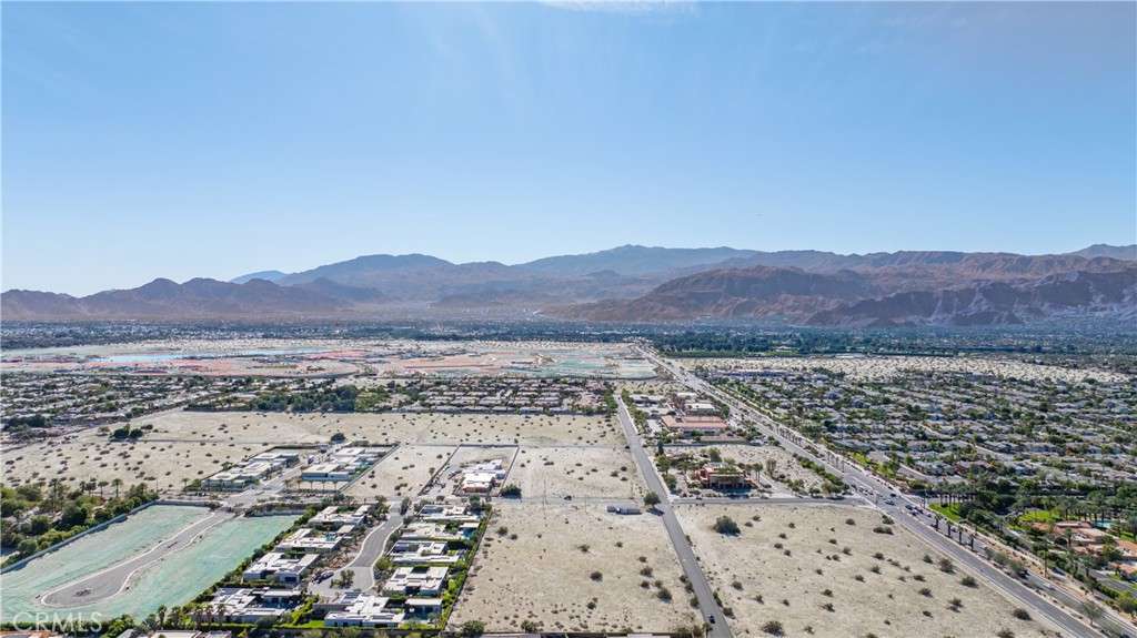 72094 Ginger Rogers Road Rancho Mirage, CA 92270 - Photo 13 of 15 an aerial view of residential house and sandy dunes