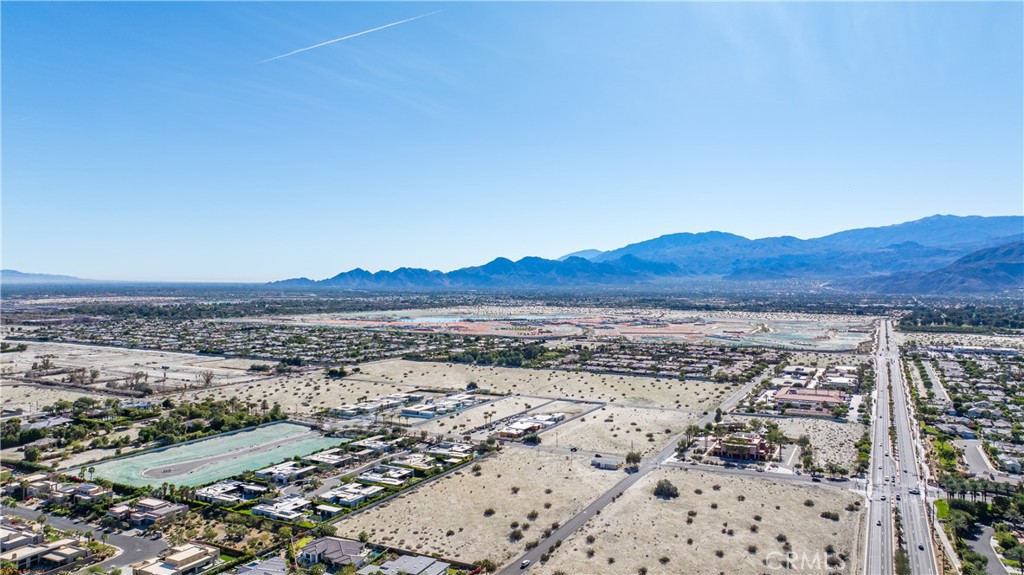 72094 Ginger Rogers Road Rancho Mirage, CA 92270 - Photo 7 of 15 an aerial view of residential house and sandy dunes