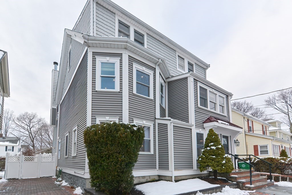 287 Cherry Street, Unit 1 Newton, MA 02465 - Photo 1 of 30 a front view of a building