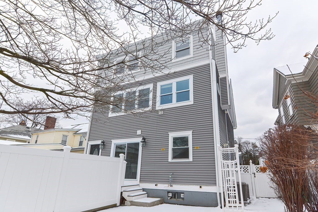 287 Cherry Street, Unit 1 Newton, MA 02465 - Photo 28 of 30 a view of a house with a tree