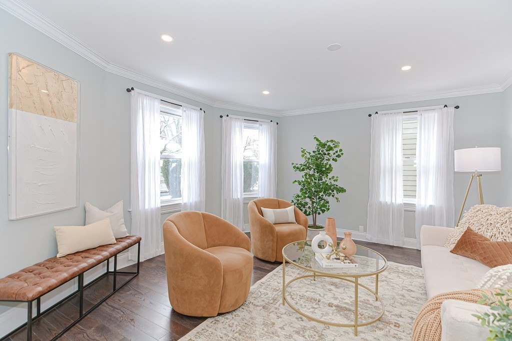 287 Cherry Street, Unit 1 Newton, MA 02465 - Photo 5 of 30 a living room with furniture and a window