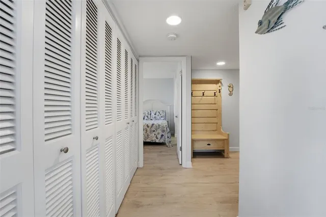 a bedroom with a bed and a dresser in it