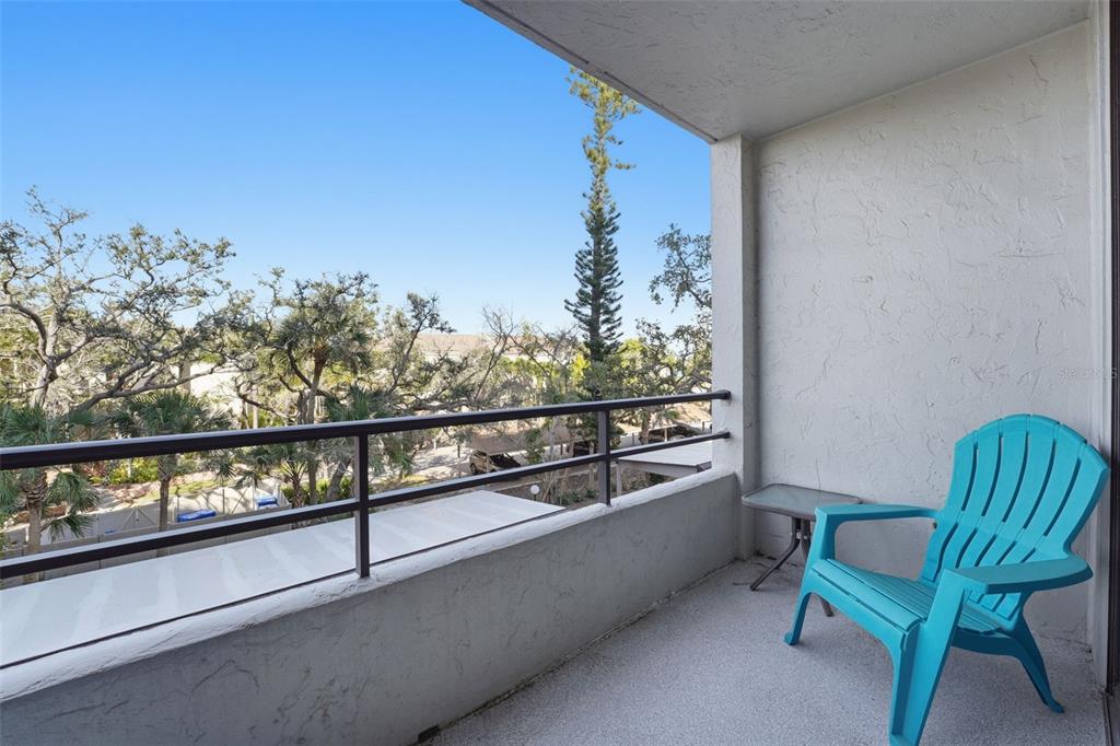 6415 Midnight Pass Road, Unit 310 Sarasota, FL 34242 - Photo 26 of 62 a view of outdoor seating