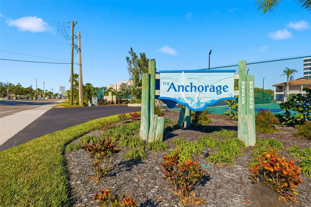 6415 Midnight Pass Road, Unit 310 Sarasota, FL 34242 - Photo 31 of 62 a sign on the side of the road