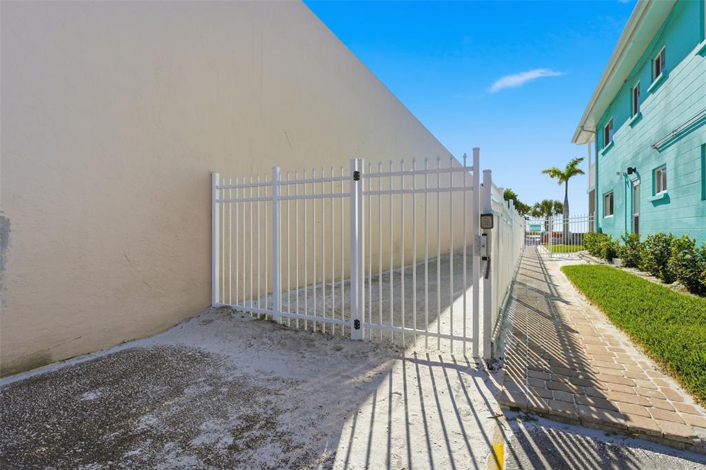 6415 Midnight Pass Road, Unit 310 Sarasota, FL 34242 - Photo 32 of 62 a view of a backyard with wooden floor