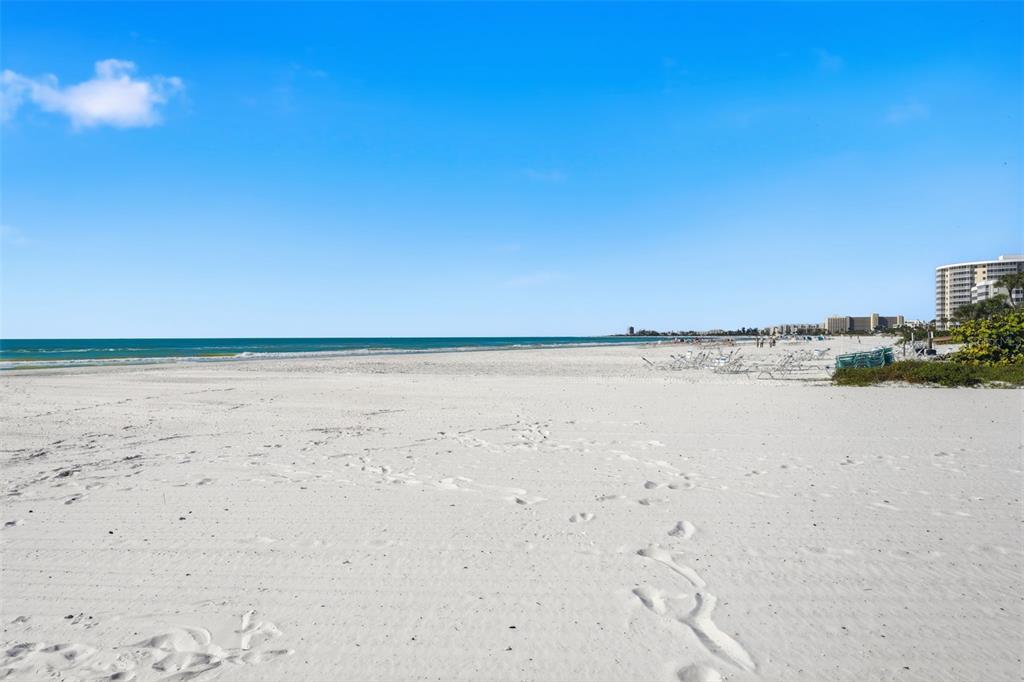 6415 Midnight Pass Road, Unit 310 Sarasota, FL 34242 - Photo 36 of 62 a view of an ocean beach