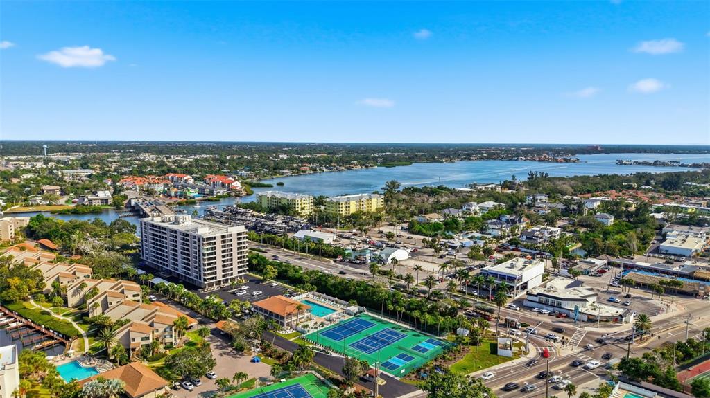 6415 Midnight Pass Road, Unit 310 Sarasota, FL 34242 - Photo 48 of 62 a city view with tall buildings