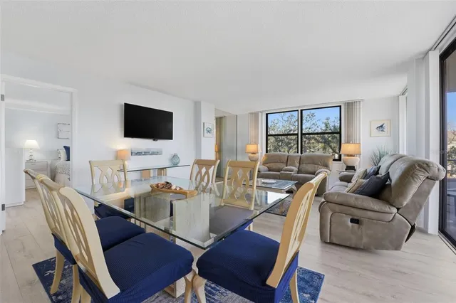 a workspace with furniture and a flat screen tv