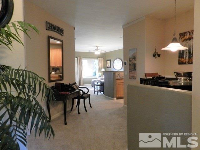 900 S Meadows, Unit 4423 Reno, NV 89521 - Photo 15 of 25 a living room with furniture and a large window