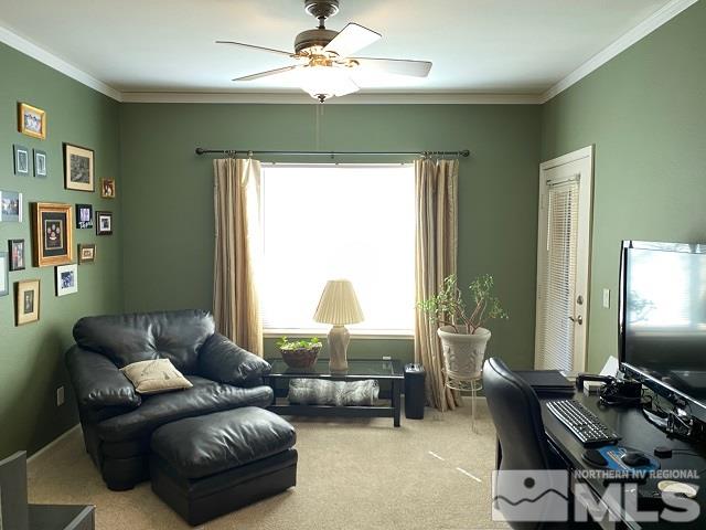 900 S Meadows, Unit 4423 Reno, NV 89521 - Photo 8 of 25 a living room with furniture and a flat screen tv
