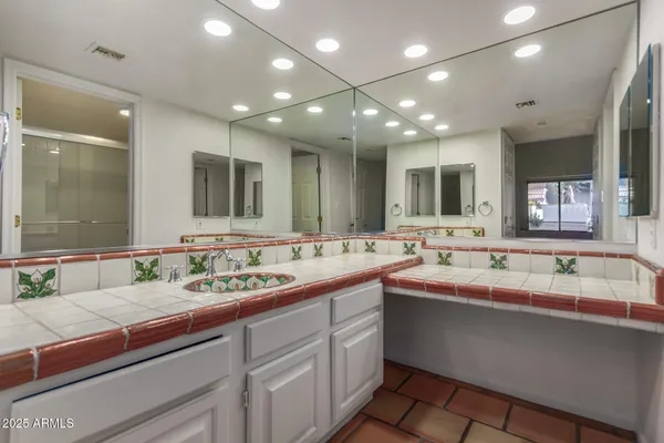 a bathroom with a shower and toilet