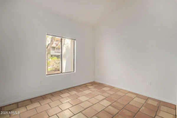 a view of a bathroom with a sink and a shower