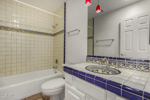 a view of a room with a large window