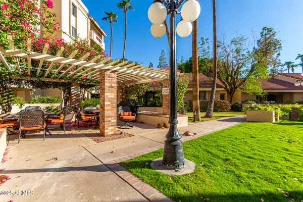 a view of a building with a fountain