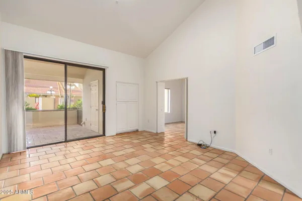 a view of a room with a large window