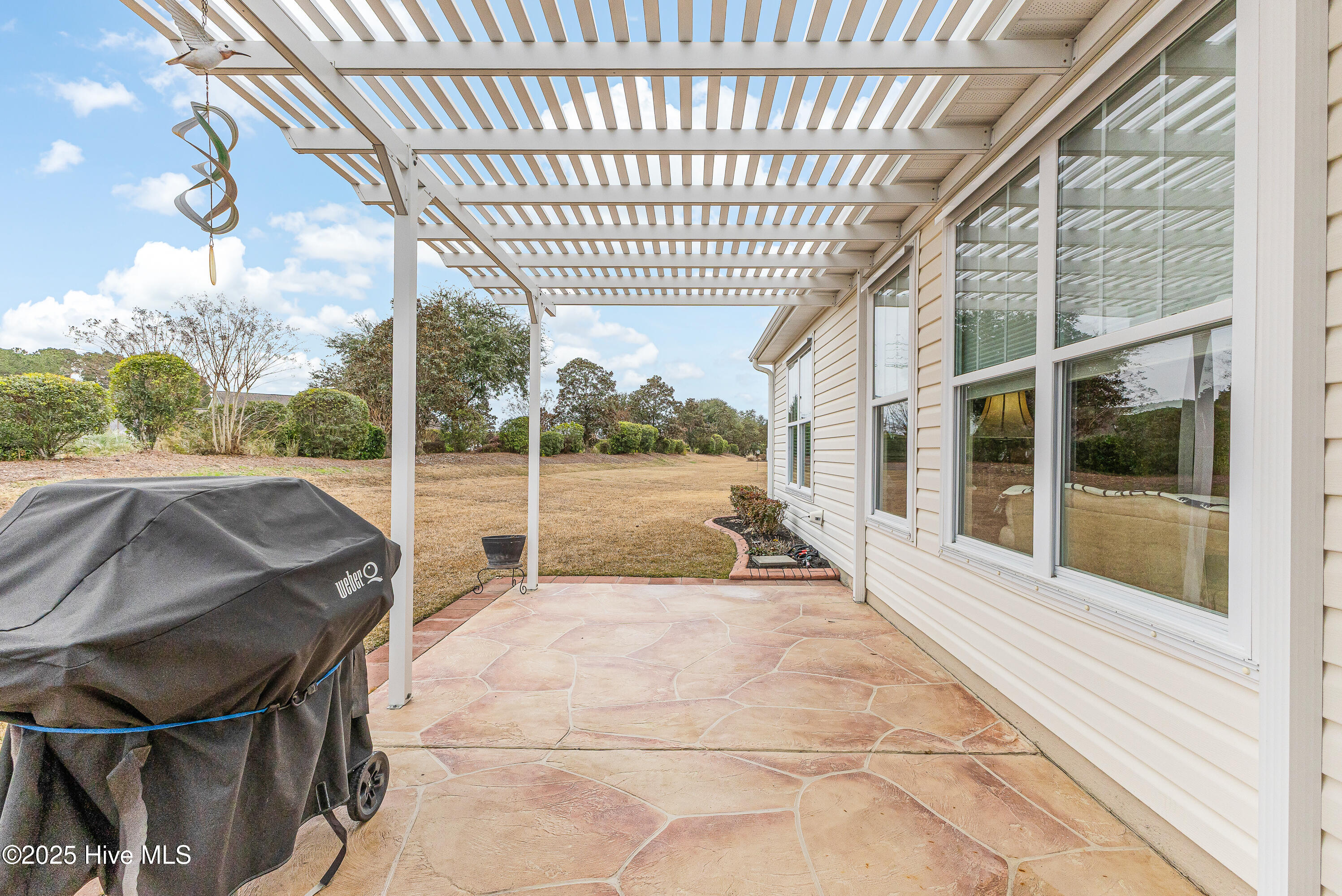 2003 Jarvis Lane Calabash, NC 28467 - Photo 35 of 68 PERGOLO NEXT TO SUNROOM