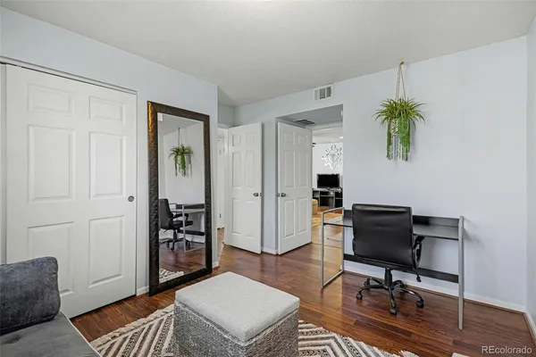 a workspace with furniture and window