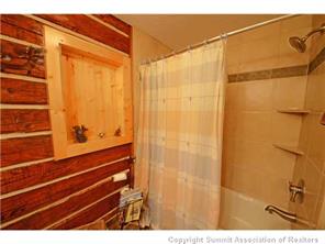 392 Alpine Road Dillon, CO 80435 - Photo 14 of 25 a bathroom with a shower and a sink