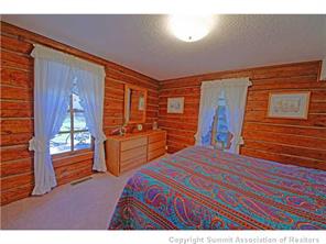 392 Alpine Road Dillon, CO 80435 - Photo 16 of 25 a bedroom with a bed and large closet