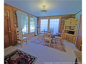 392 Alpine Road Dillon, CO 80435 - Photo 18 of 25 a living room with furniture a rug and a window