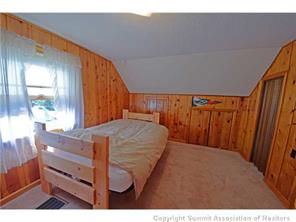 392 Alpine Road Dillon, CO 80435 - Photo 20 of 25 a bed room with a bed