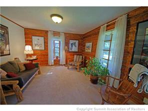 392 Alpine Road Dillon, CO 80435 - Photo 6 of 25 a living room with furniture and a potted plant