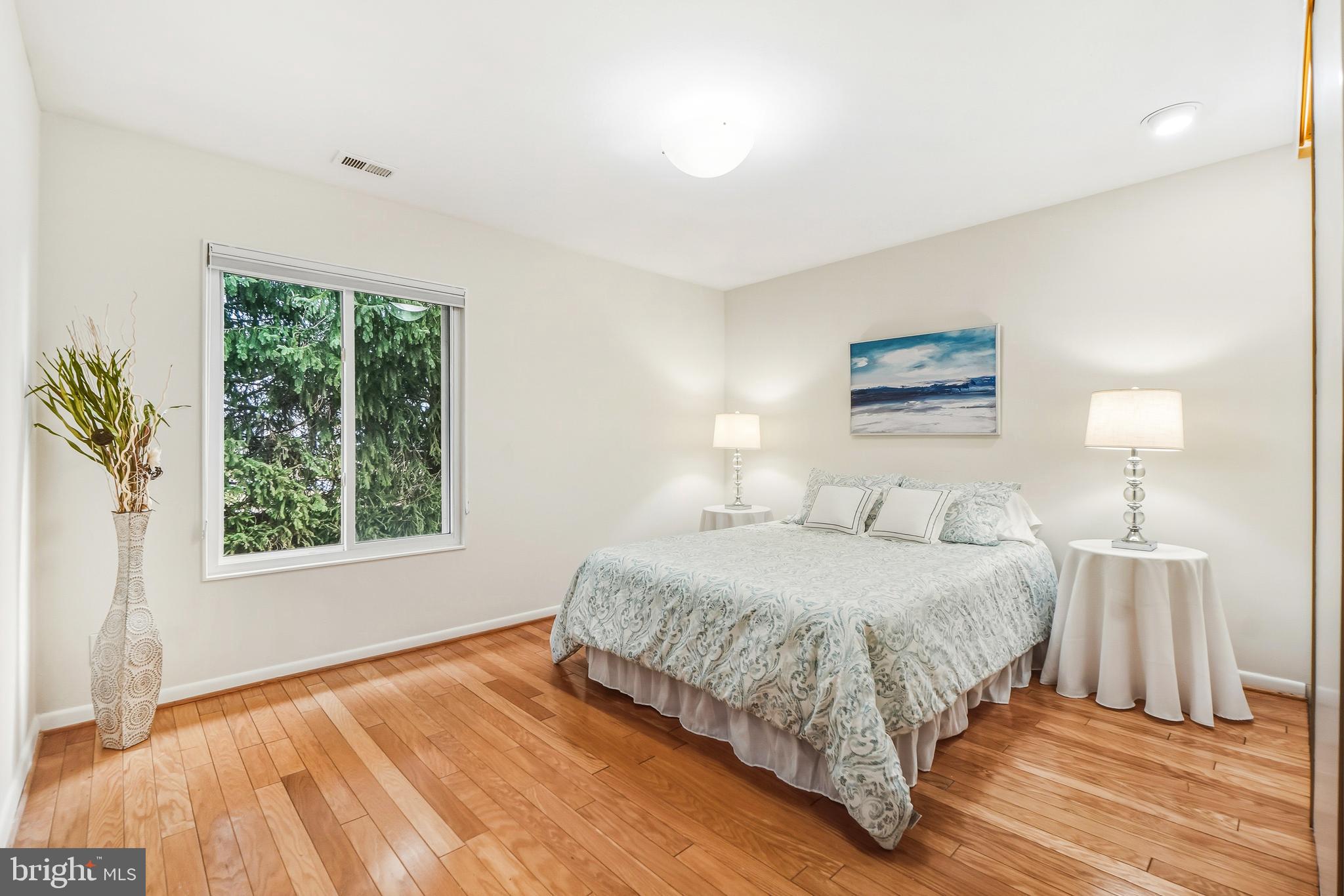 3506 Fiske Terrace, Unit 153A Silver Spring, MD 20906 - Photo 16 of 43 Primary bedroom has engineered hardwood floors