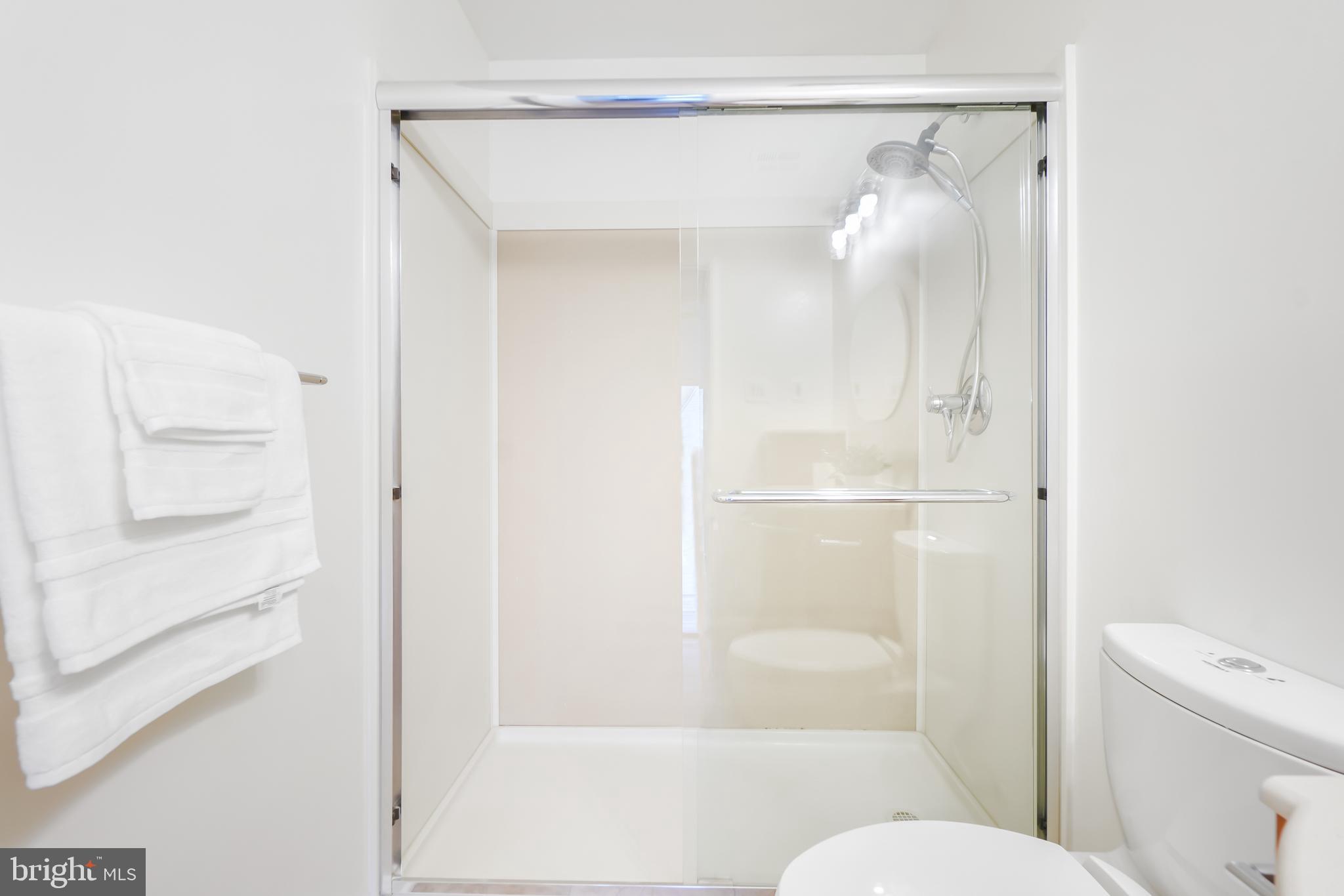 3506 Fiske Terrace, Unit 153A Silver Spring, MD 20906 - Photo 19 of 43 Walk-in shower in the primary bathroom