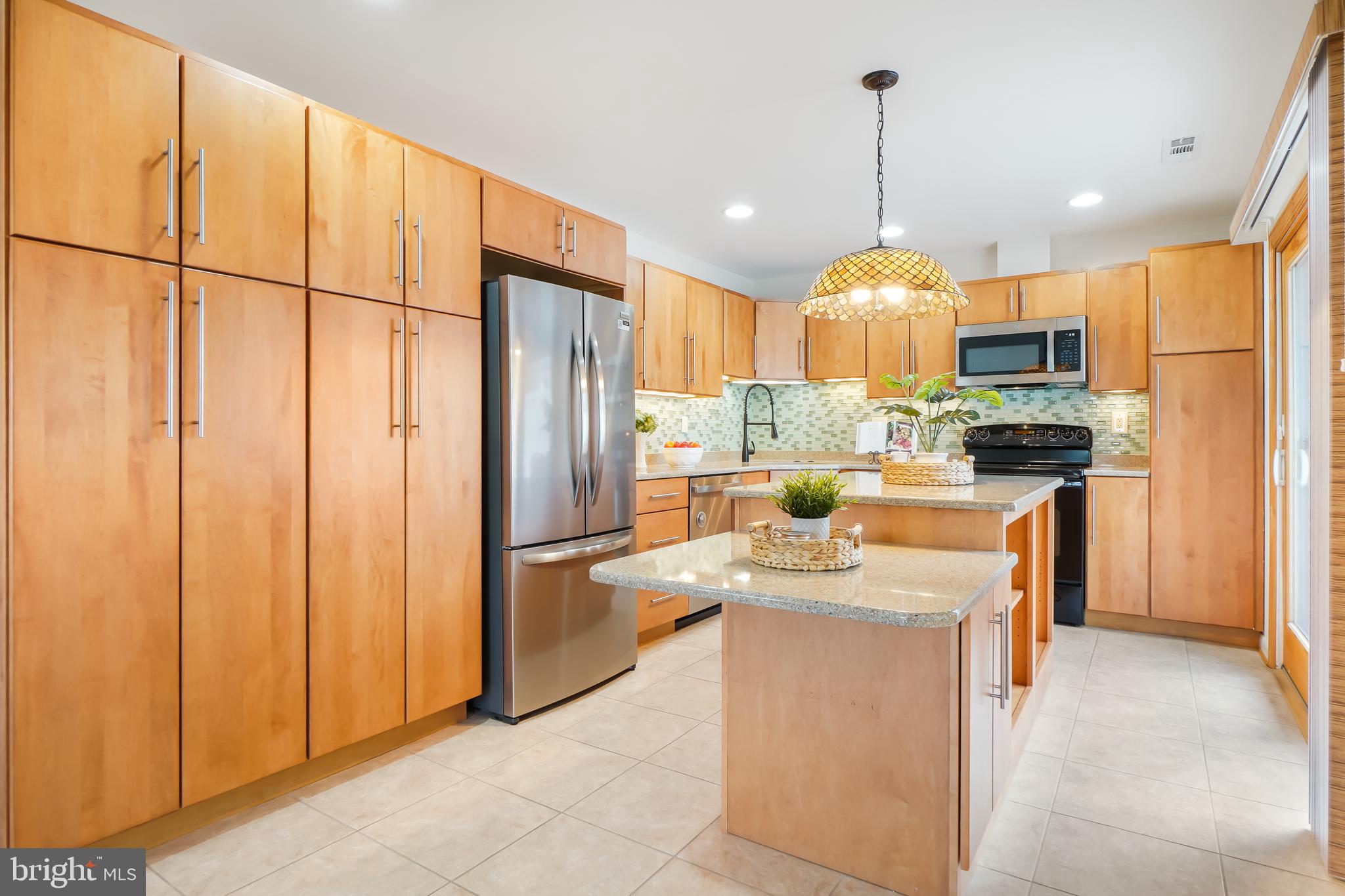 3506 Fiske Terrace, Unit 153A Silver Spring, MD 20906 - Photo 9 of 43 Lots of added maple cabinets in the Kitchen