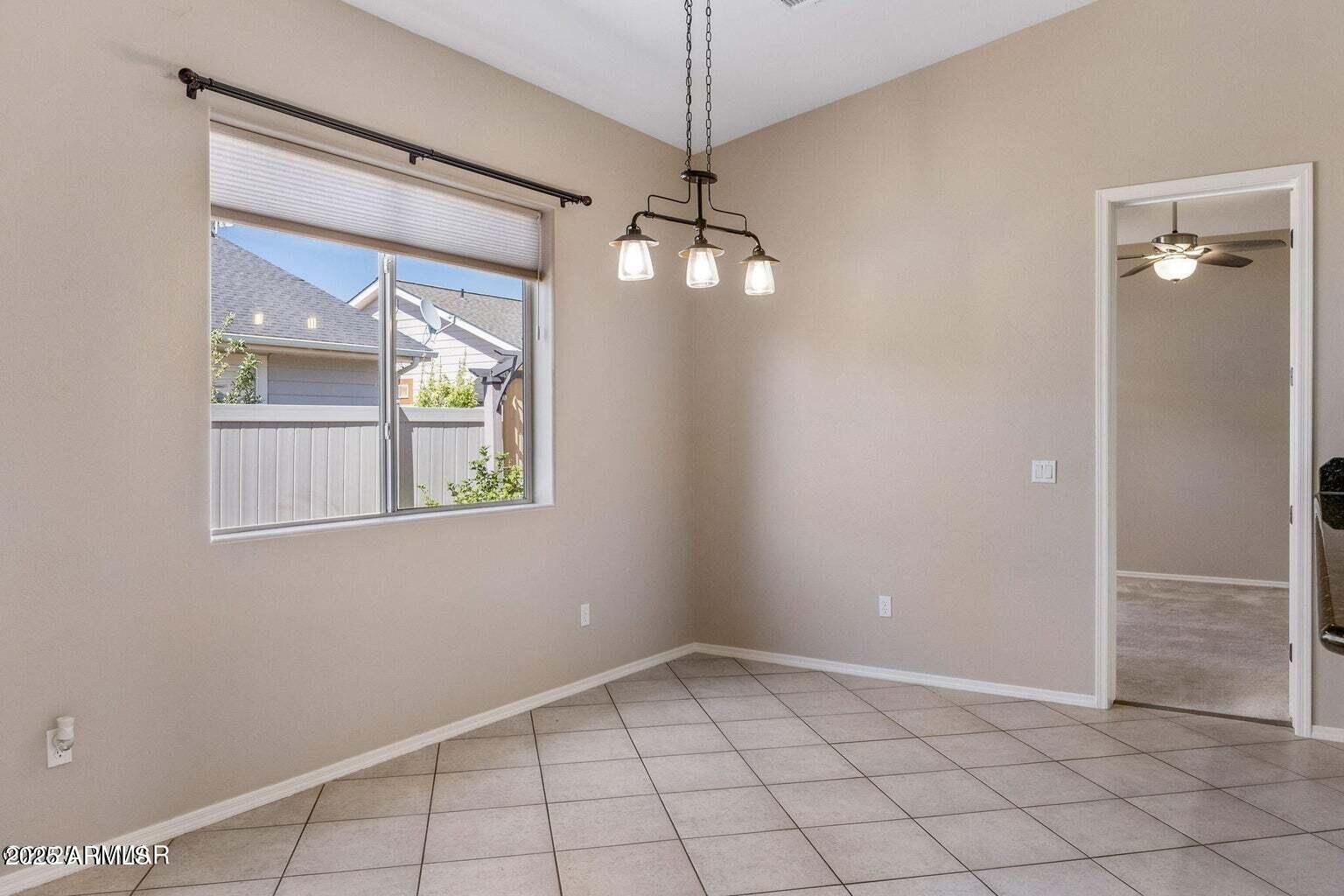 1058 East Adams Street Snowflake, AZ 85937 - Photo 14 of 36 a view of an empty room with a window