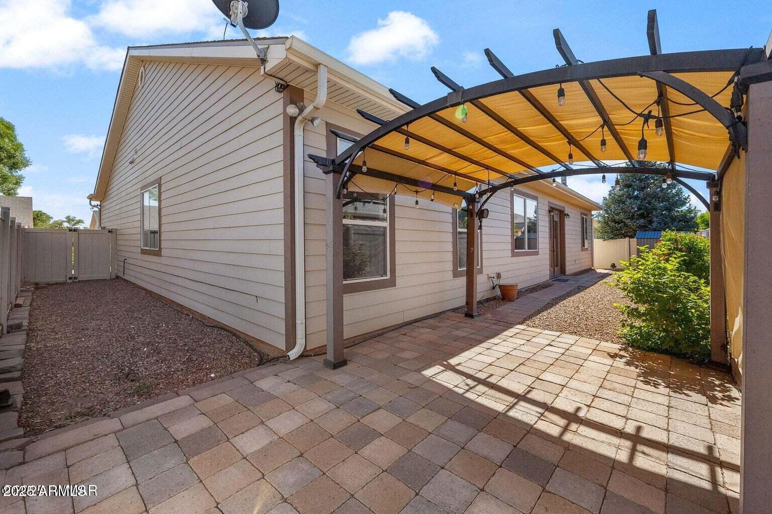 1058 East Adams Street Snowflake, AZ 85937 - Photo 22 of 36 a view of a house with a backyard
