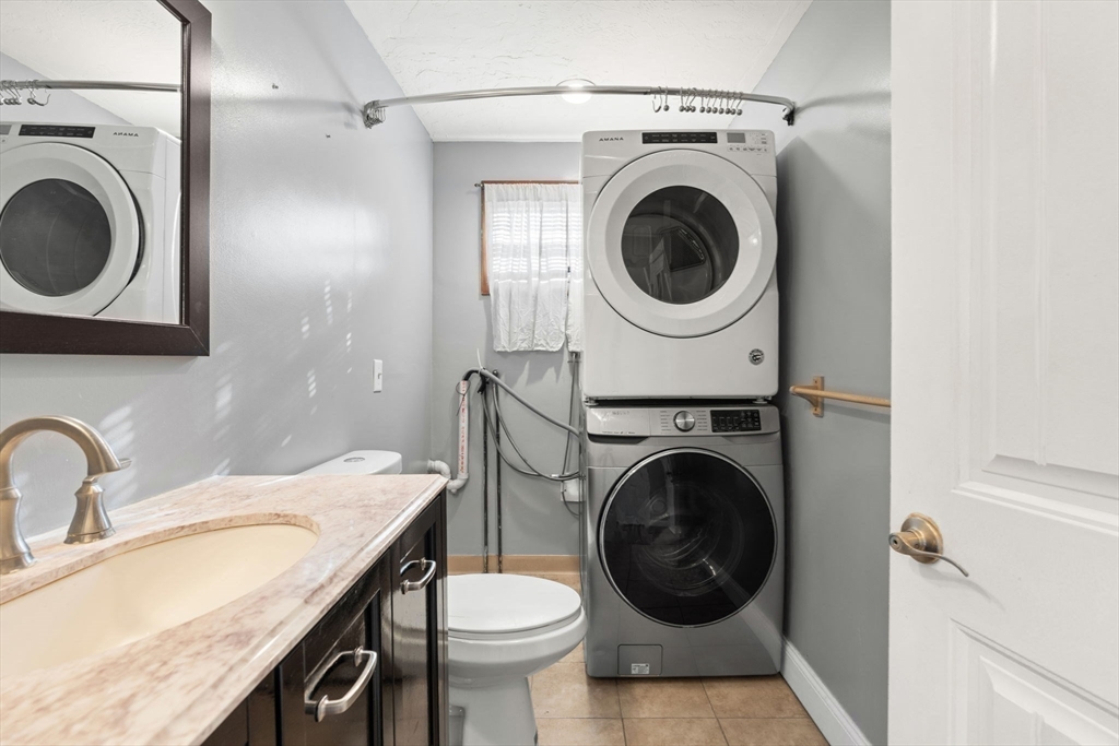70 West High Street, Unit 2 Avon, MA 02322 - Photo 8 of 22 a utility room with sink washing machine and a washer