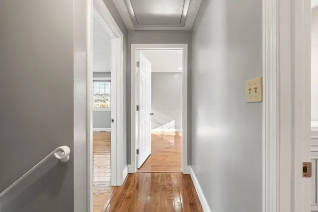 a view of a bathroom from a hallway