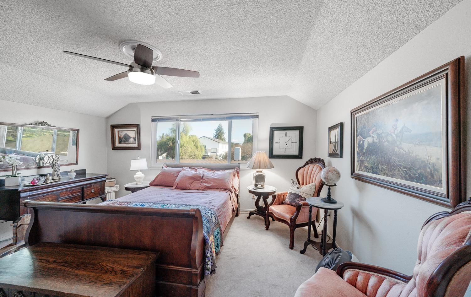 20058 Cardoza Road Los Banos, CA 93635 - Photo 16 of 30 a bedroom with furniture and a window