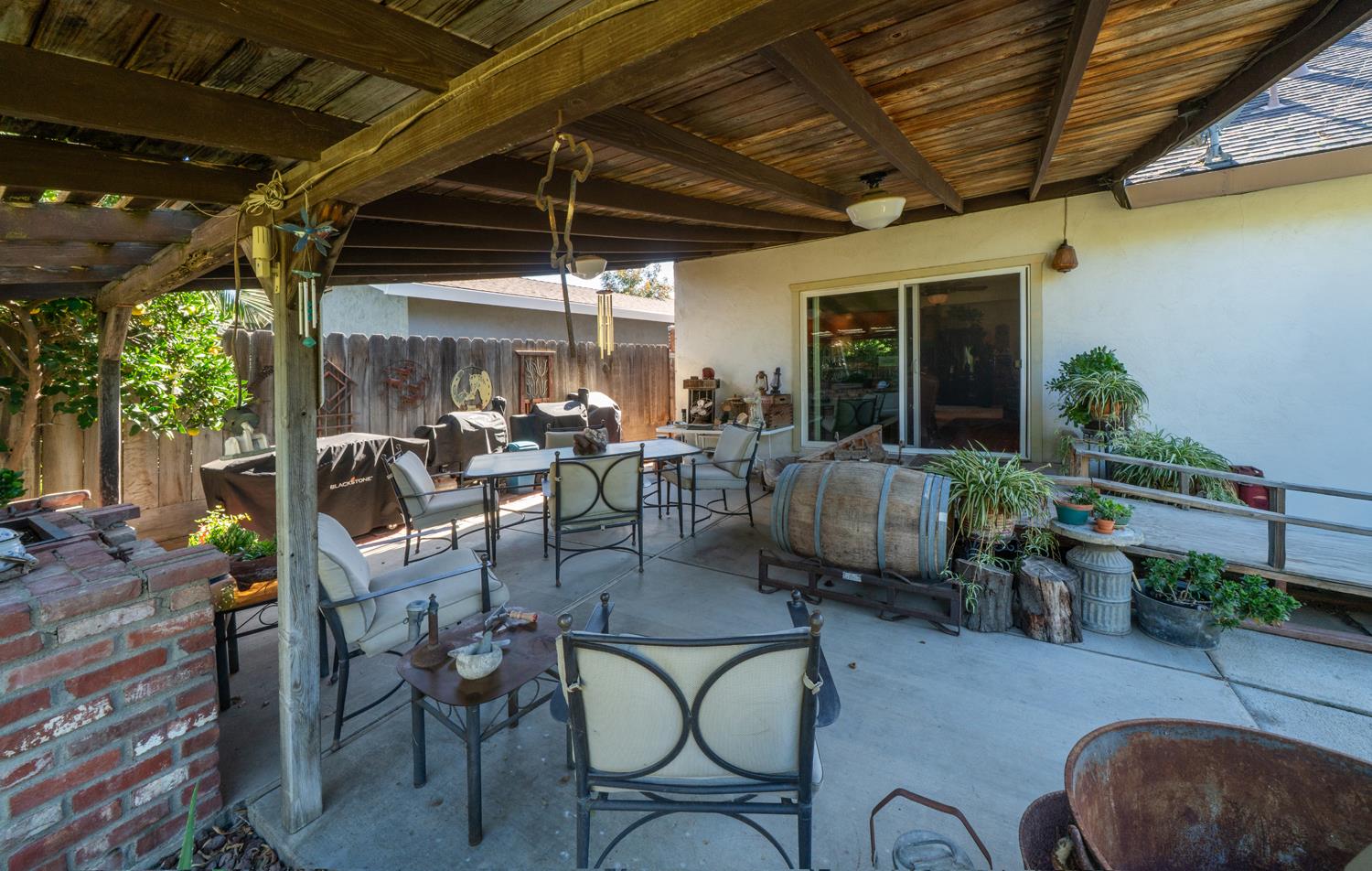 20058 Cardoza Road Los Banos, CA 93635 - Photo 20 of 30 a view of a dinning table and chairs in patio