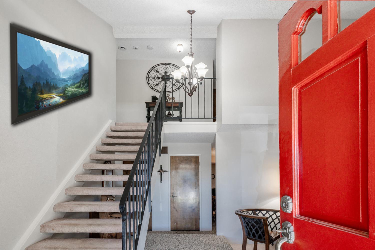 20058 Cardoza Road Los Banos, CA 93635 - Photo 4 of 30 a view of a livingroom with stairs and furniture